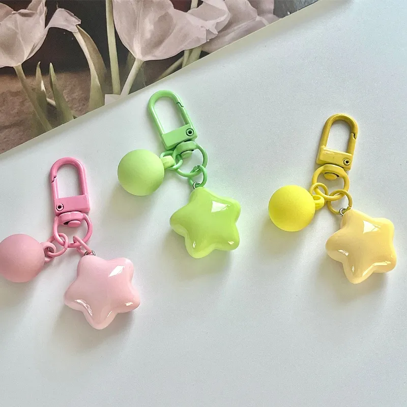 DHgate.com:Starry Delight: Resin Keychain with Earphone Case