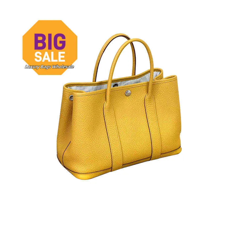 DHgate.com:Amber Yellow Leather Tote Bag for Women: Classic