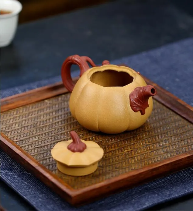 Handcrafted Yixing Zisha Teapot: Unique Pumpkin Shape, 250ml, Purple Clay, Original Mine, Chinese Hand Carved Tea Set, Perfect Gift From Homepro18, $235.18 | DHgate.Com Handcrafted Yixing Zisha Teapot: Unique Pumpkin Shape, 250ml, Purple Clay, Original Mine, Chinese Hand Carved Tea Set, Perfect Gift From Homepro18, $235.18 | DHgate.Com