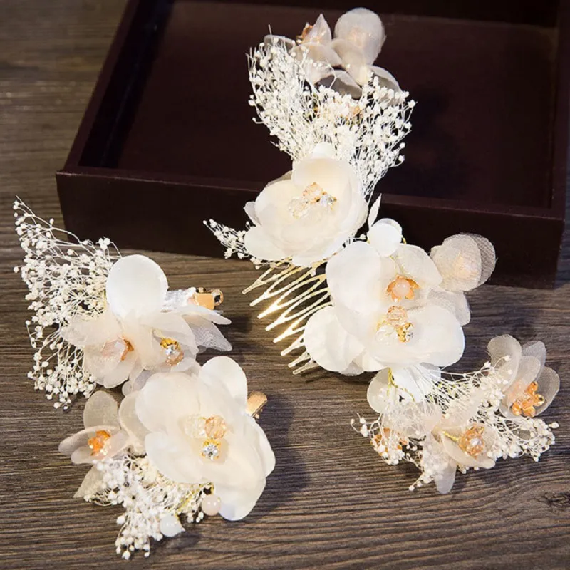White Floral Crystal Hair Comb Metal Wedding Tiara... From  display picture 1