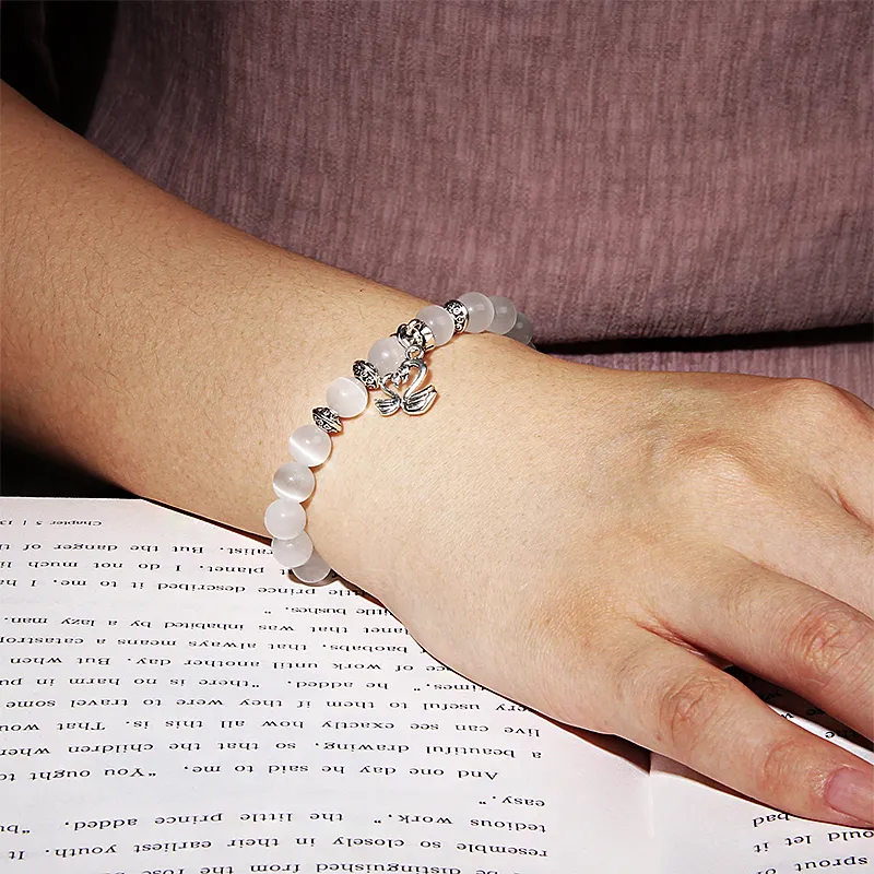 Crystal Bracelets for Women: Opal & Cat's Eye Crystal Bead Bangle with Swan & Elephant Charm - Elegant Women's Jewelry - Picture 2 Of 4