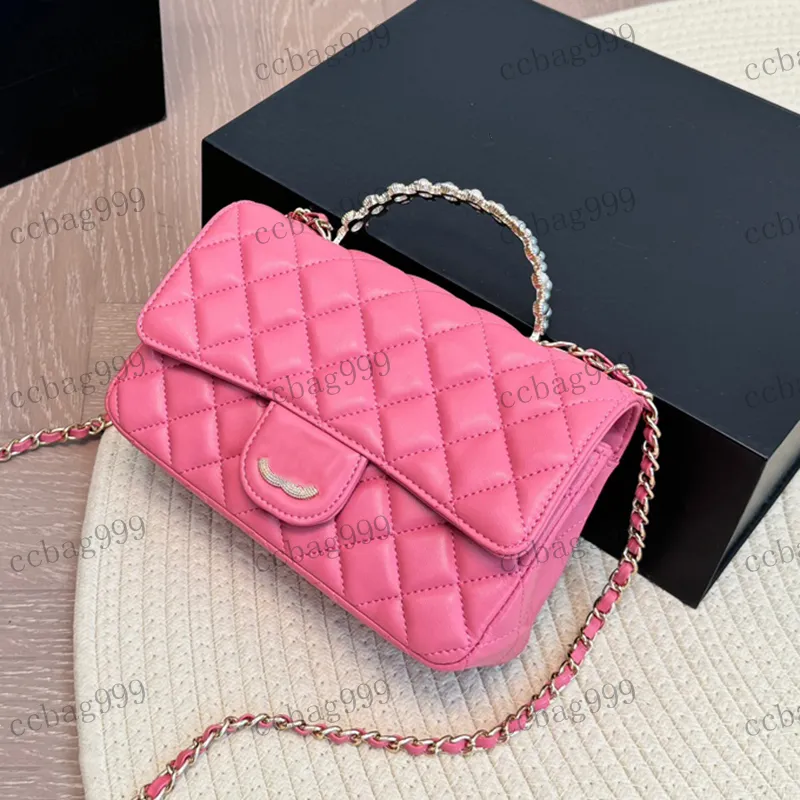 chain wallet in pink and white textured matelassé leather