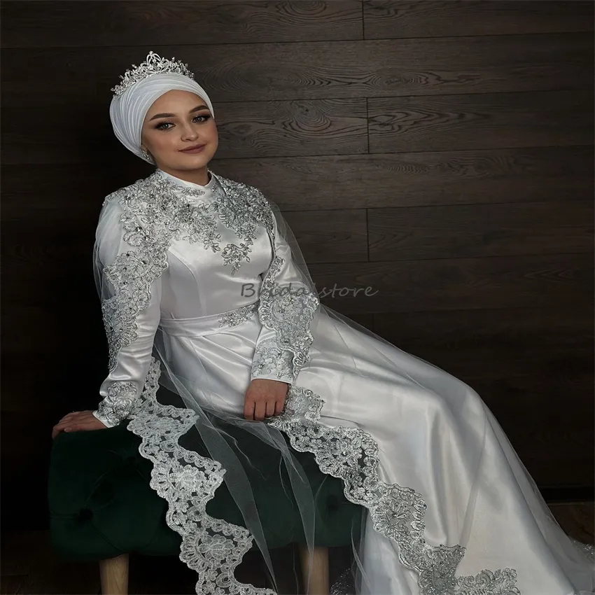 Arabic Islamic Wedding Dress with Cape, High Neck, Long Sleeves, Silver Appliques, Lace, and White Abaya Wedding - Perfect for Ah and Bridal Occasions