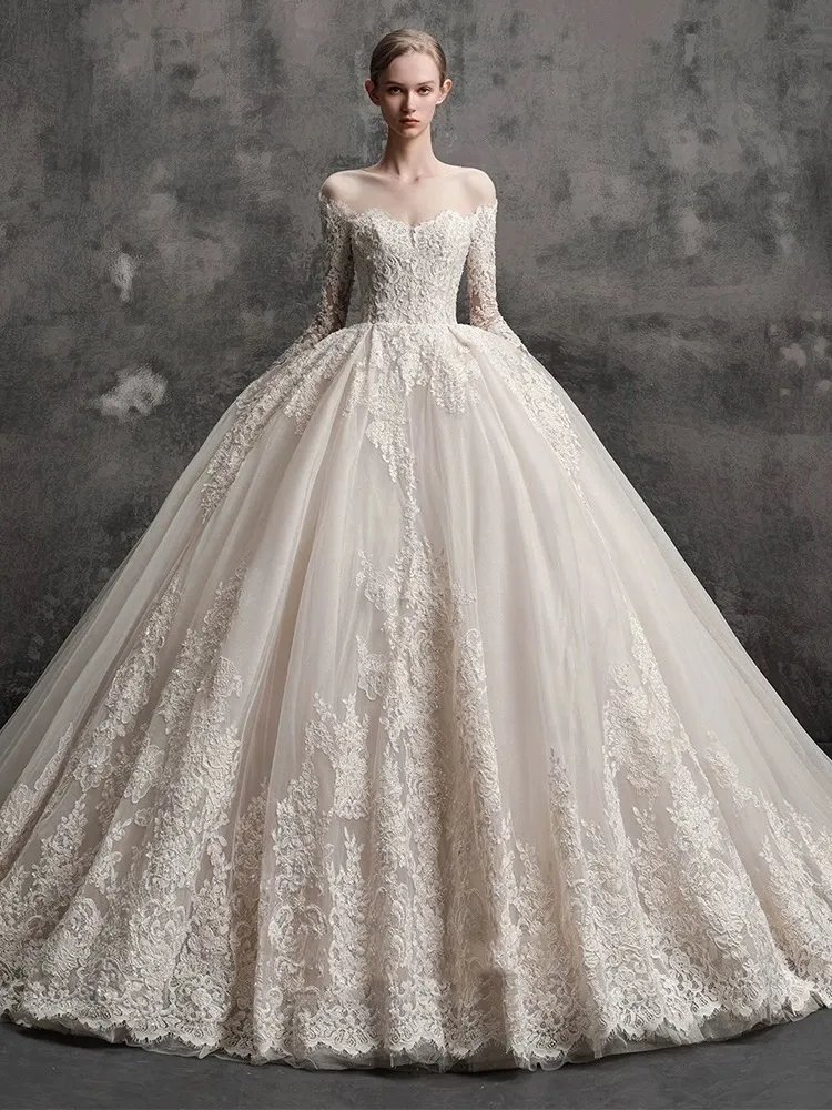 Enchanting Off-Shoulder Lace Wedding Dress with Puffy Sleeves and