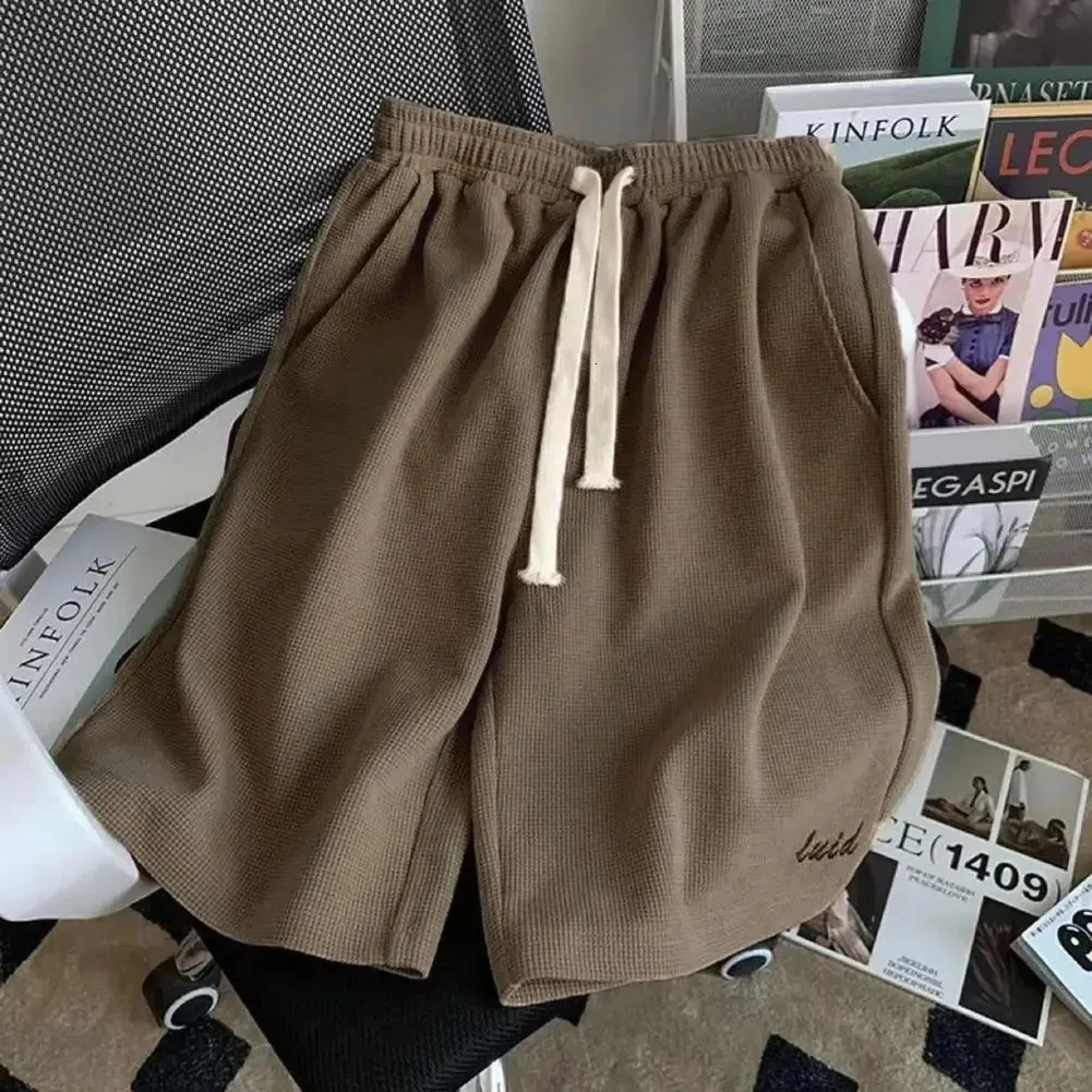 Combinaison de sport gaufrée unisexe été hommes ample à manches courtes t-shirt short jogging tenue deux pièces ensemble lettre imprimé décontracté_voghion.com