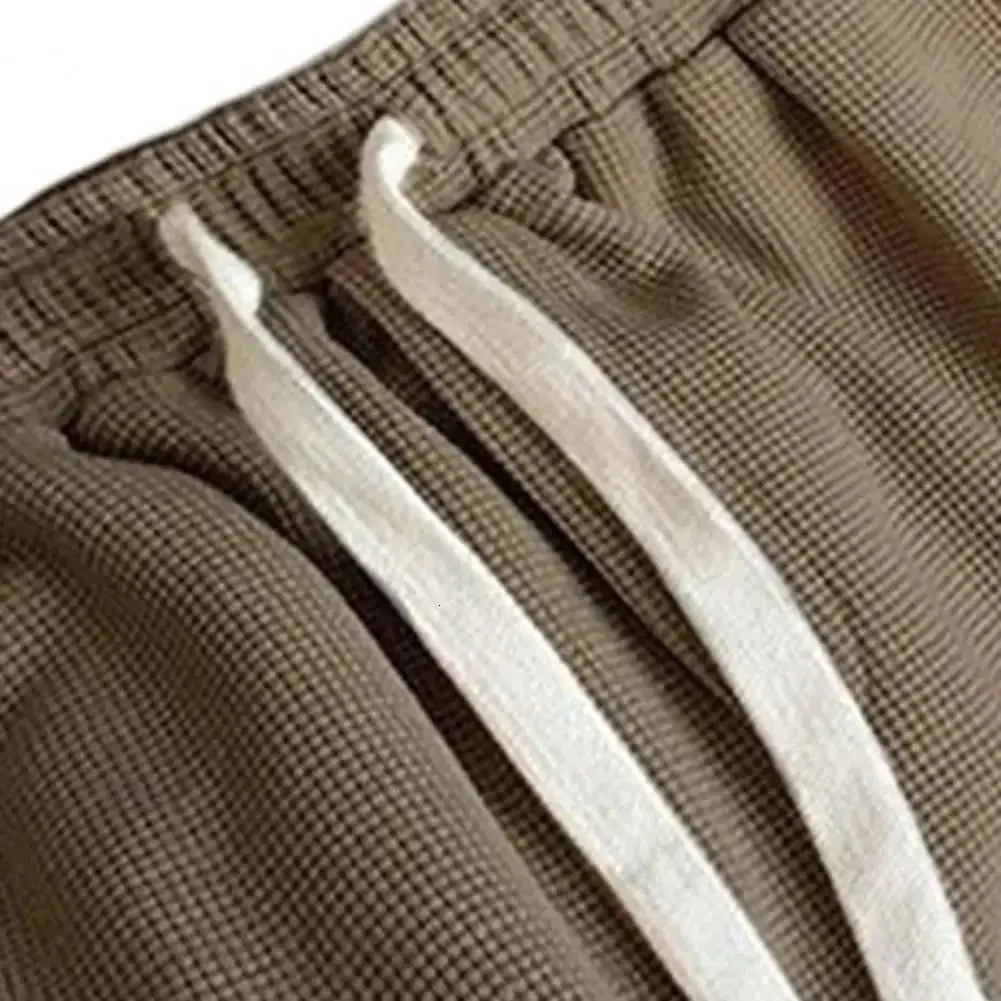 Combinaison de sport gaufrée unisexe été hommes ample à manches courtes t-shirt short jogging tenue deux pièces ensemble lettre imprimé décontracté_voghion.com