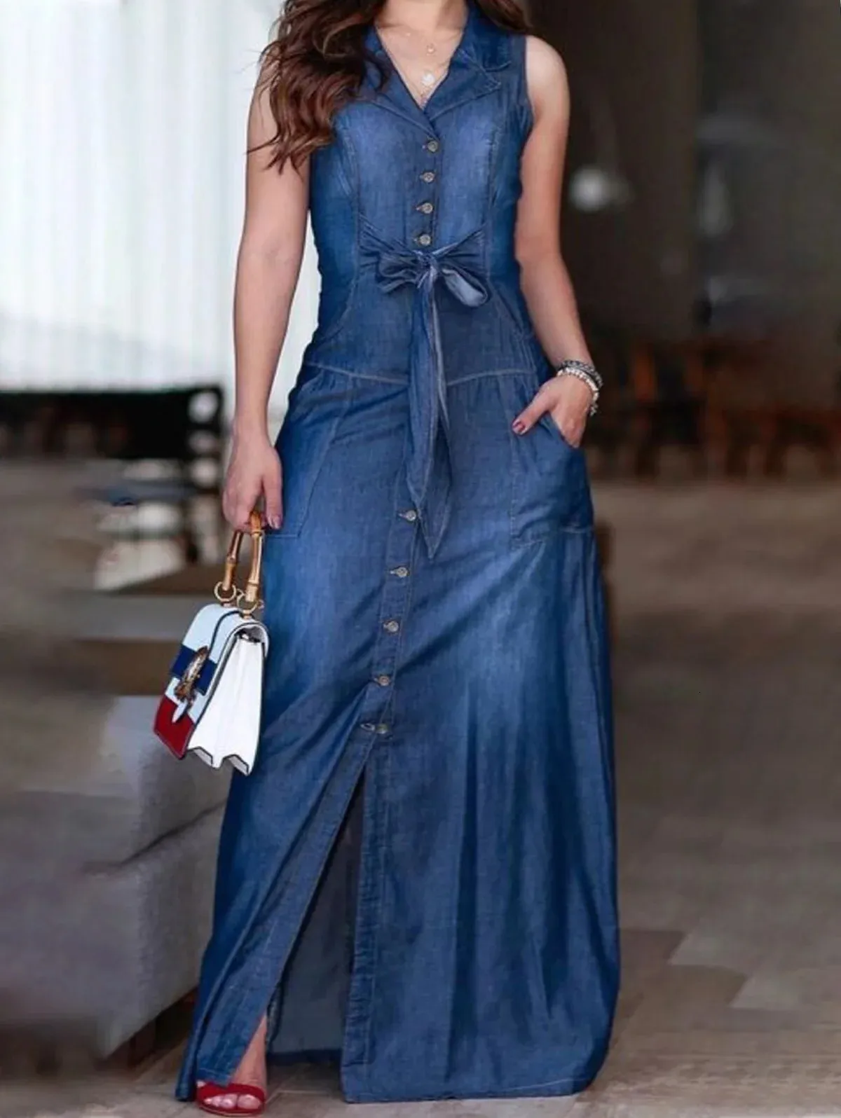 Fashion Jeans Long Gown Summer New Denim Dress Female Design Sense Hollowed Out Slimming Temperament Slit Fashion Jeans Long Gown Summer New Denim Dress Female Design Sense Hollowed Out Slimming Temperament Slit