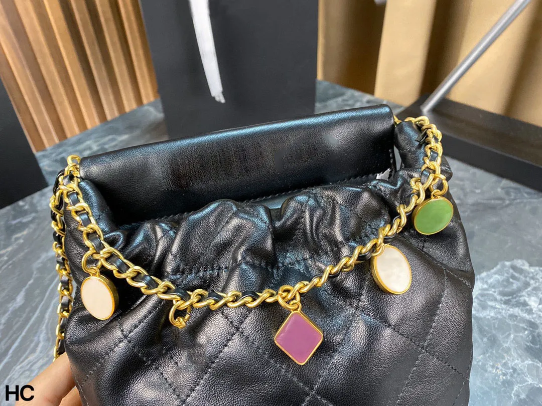 Quilted leather shoulder bag with chain strap hotsell