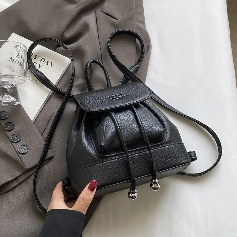 Small Leather Backpack: Stylish & Lightweight - Perfect for  display picture 3