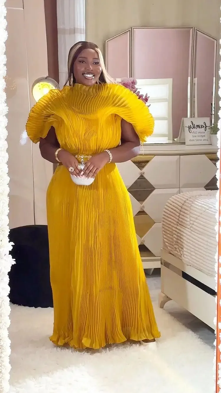 designer dresses miyake DESIGN and ART MAGAZINE: Paris Fashion Week: Issey Miyake Spring/Summer 2026 ~ A Study in Form, Freedom, and the Future of Dress