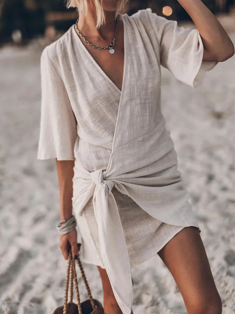 Cotton linen summer onepiece dress womens solid lace up Vneck short sleeve  black casual beach vest from Dhgate Urban Sexy Dresses - price 19.95