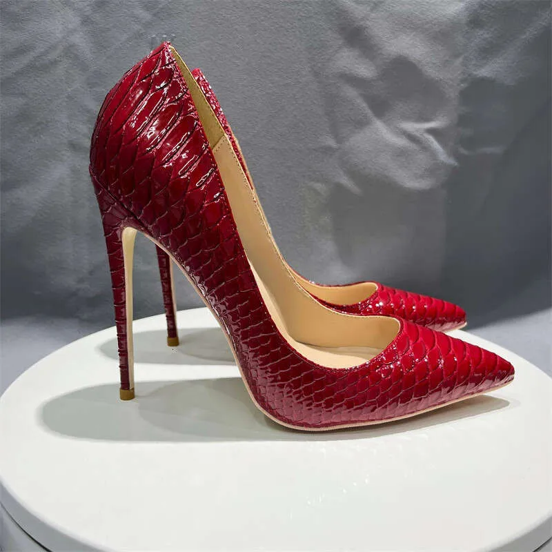 red dress with snakeskin heels What Shoes to Wear With a Red Dress