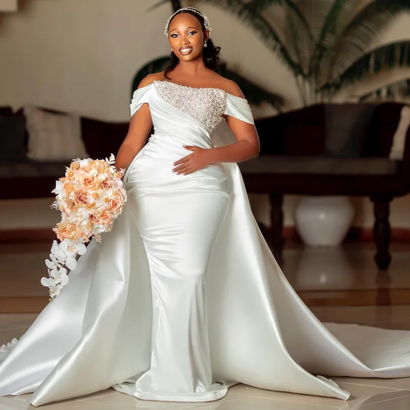 Plus Size African Detachable Train Wedding Dress with Detachable Train, Illusion Mermaid Silhouette, Sheer Neckline, Satin Fabric, Beaded Pearls -