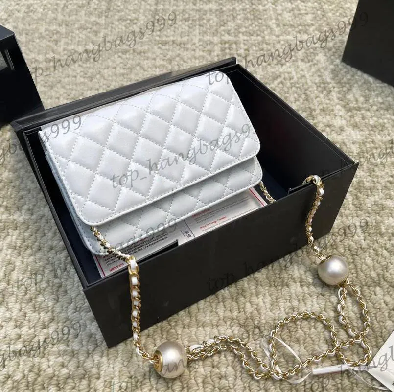 chain wallet in pink and white textured matelassé leather