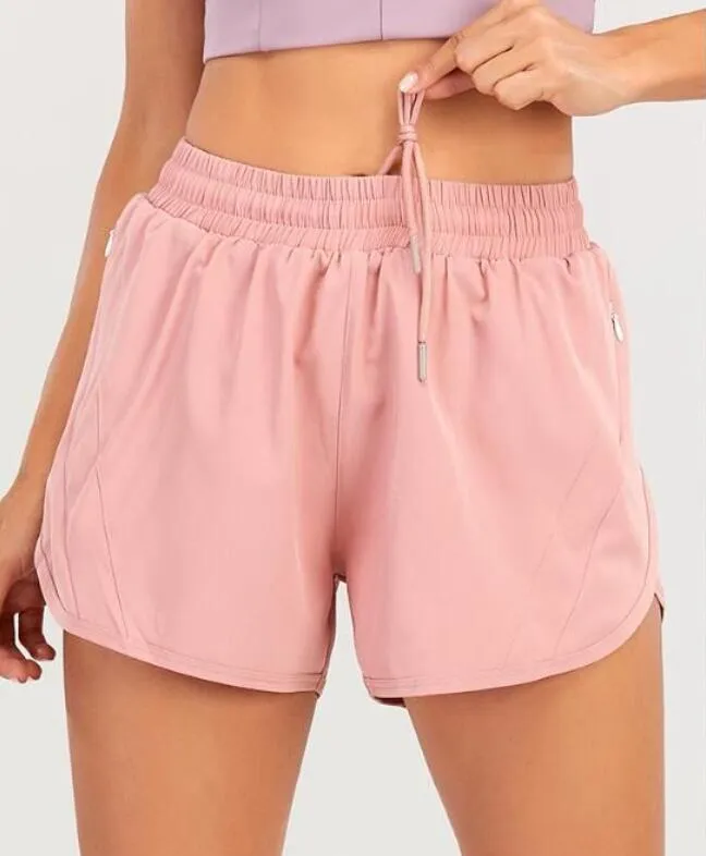 2023 Calças femininas lu-33 Yoga Shorts Hotty Calças quentes Bolso Secagem rápida Acelerar Roupas de ginástica Roupa esportiva Respirável Aptidão Leggings de cintura elástica alta