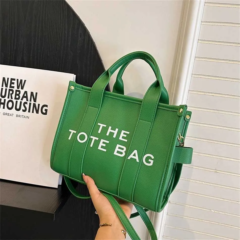 Nuevo y popular bolso de mano con estampado de lichi y bolso de hombro de gran capacidad con letras Liquidación 85% de descuento