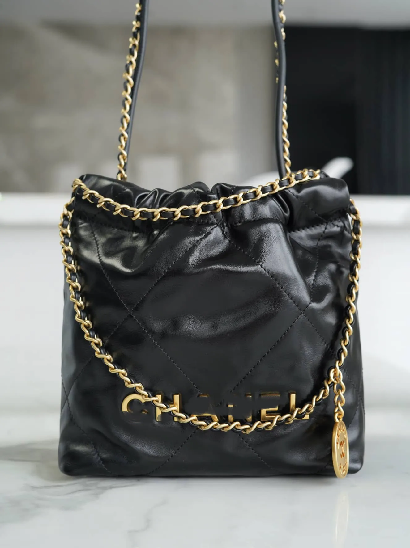Black and gold designer purse sale