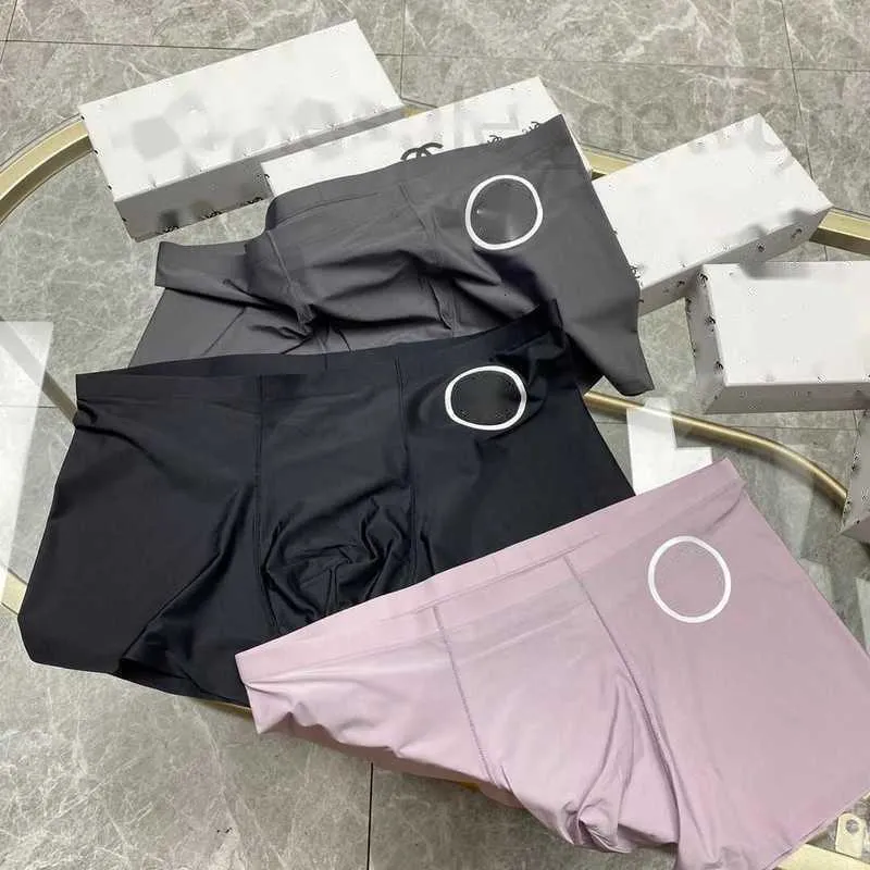 Mutande Designer Intimo da uomo, pantaloncini ad angolo piatto, vita media casual liscia in seta traspirante, nuovo stile da uomo in scatola in tre pezzi 9UA0