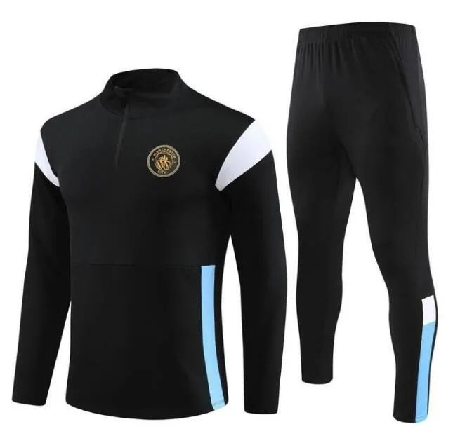 Man city tracksuit mens on sale