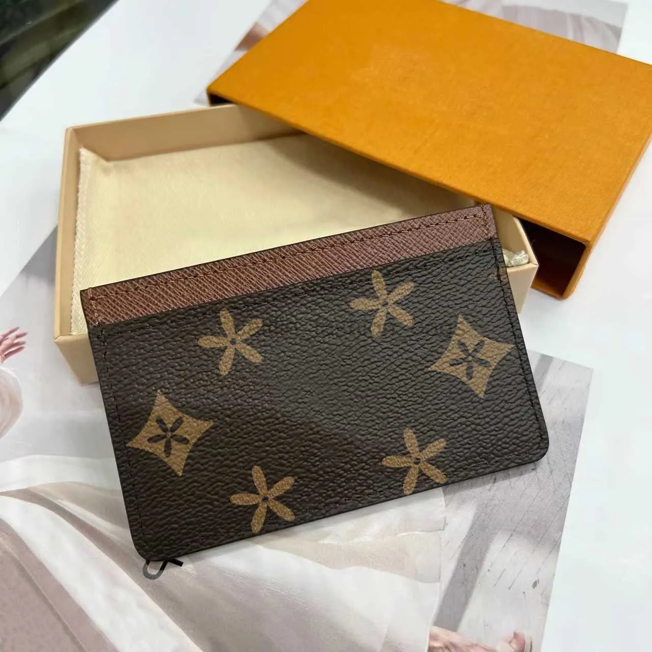 Clutch Bags 2023 Portemonnee van topkwaliteit Dames visitekaartjeshouder Echt lederen portemonnee Designer Portemonnees vierkante kaarthouder Sleutelportefeuilles caitlin_fashion_bags