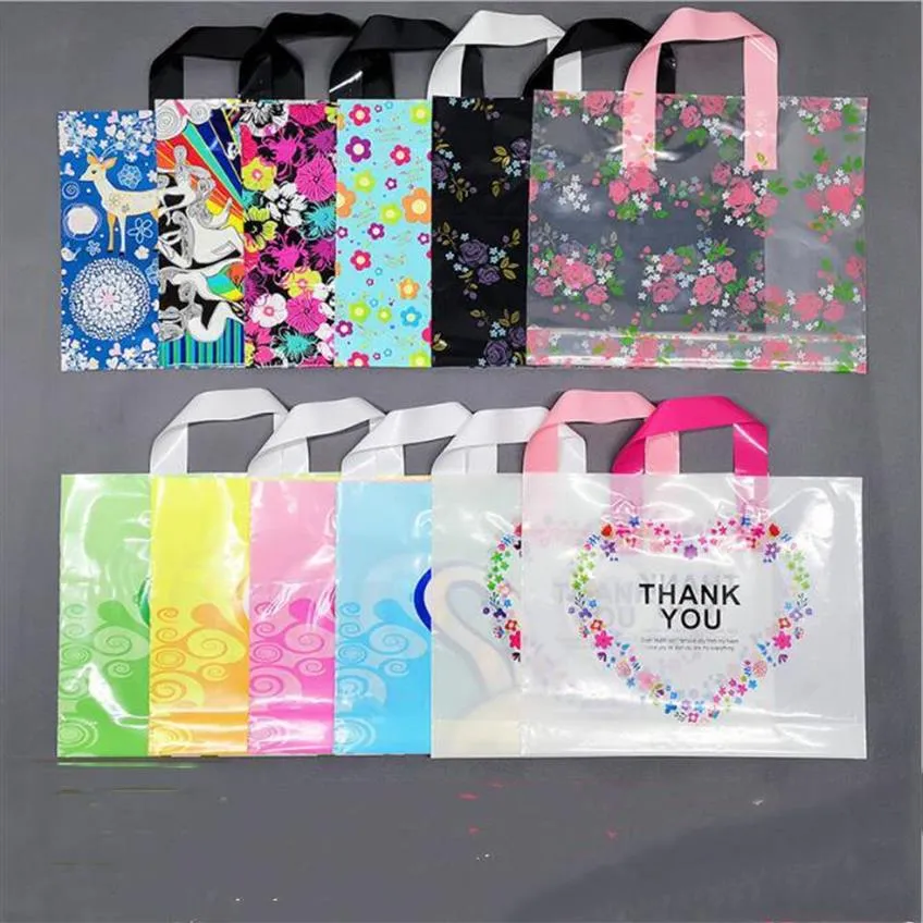 50st Lot Plastic Present Wrap Bag 30 25cm med handtag Flower Cartoon Söt presentpåse Stor shopping Tyg Party Candy Packaging Väskor X3064