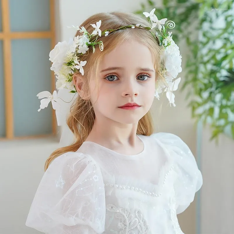 Tocados Velo con diadema y decoración floral para niños