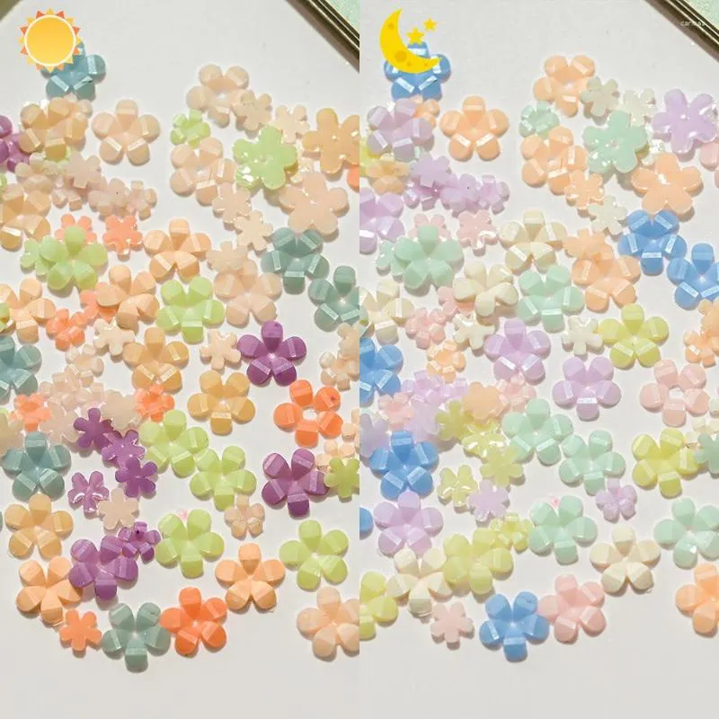 Decoraciones de arte de uñas 100 piezas de flores sensibles a la luz coloridas UV que cambian de color joyería de flora de cinco pétalos DIY acrílico encantos de manicura #