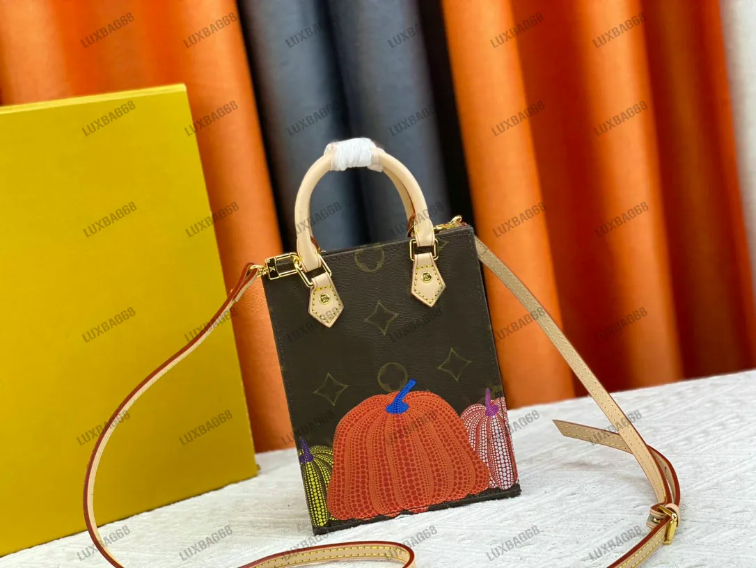 23ss YK Petit Sac Plat Pumpkin Gradient Mini Tote Dames Luxe clutch Canvas Leer YK Bladmuziek Modeontwerper Handtas Shopper M82112