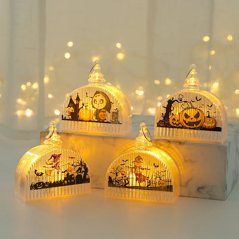 Lanterne di zucca di Halloween per bambini. Ornamenti decorativi di Halloween portatili, oggetti di scena luminosi, grucce per feste