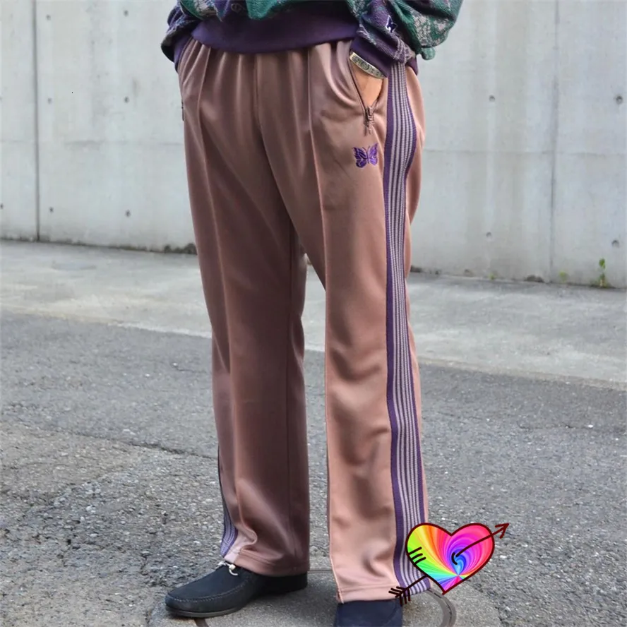 Giacca sportiva con cerniera da uomo Needles con farfalla ricamata Uomo Donna Maglia AWGE Track High Street Poly Smooth Coat_voghion.com