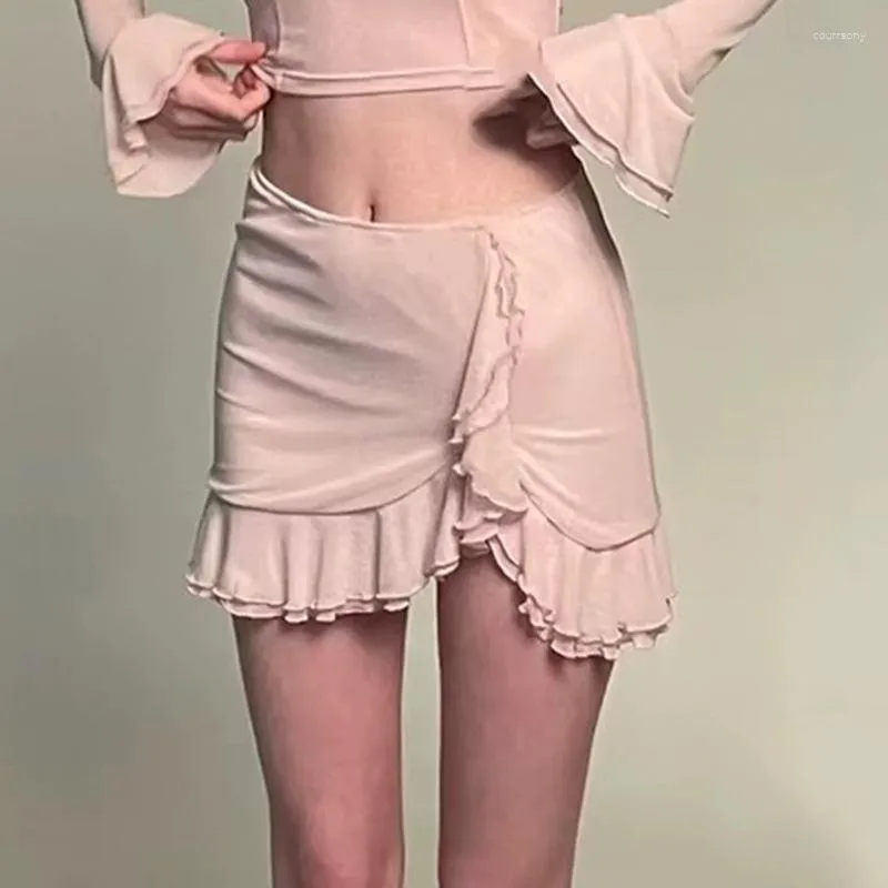 Jupes couleur unie taille haute irrégulière à volants élastique mini jupe fille épicée sexy mince pour les femmes américaines rétro y2k vêtements