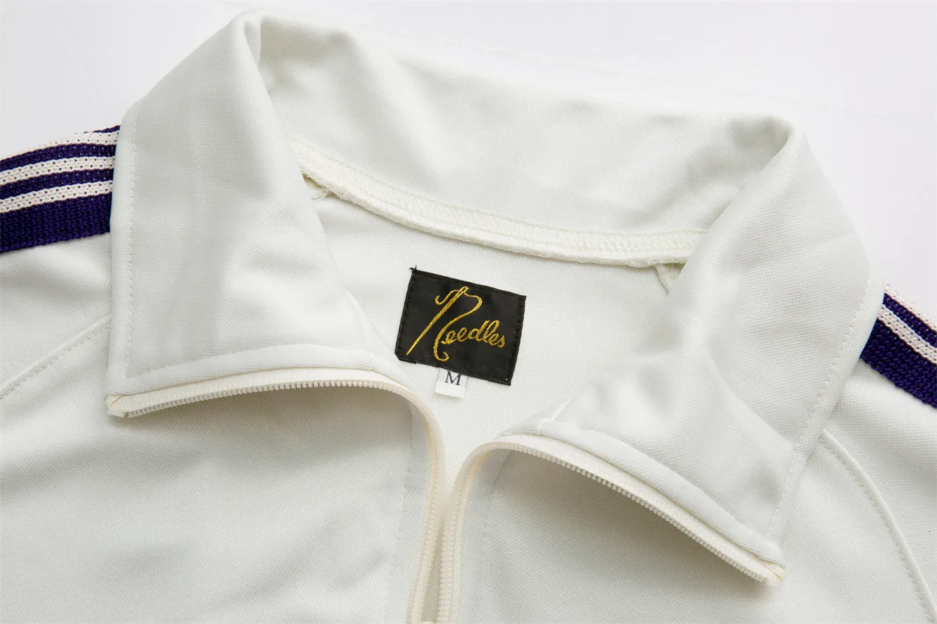 Giacca sportiva uomo needles con ricamo farfalla track_voghion.com