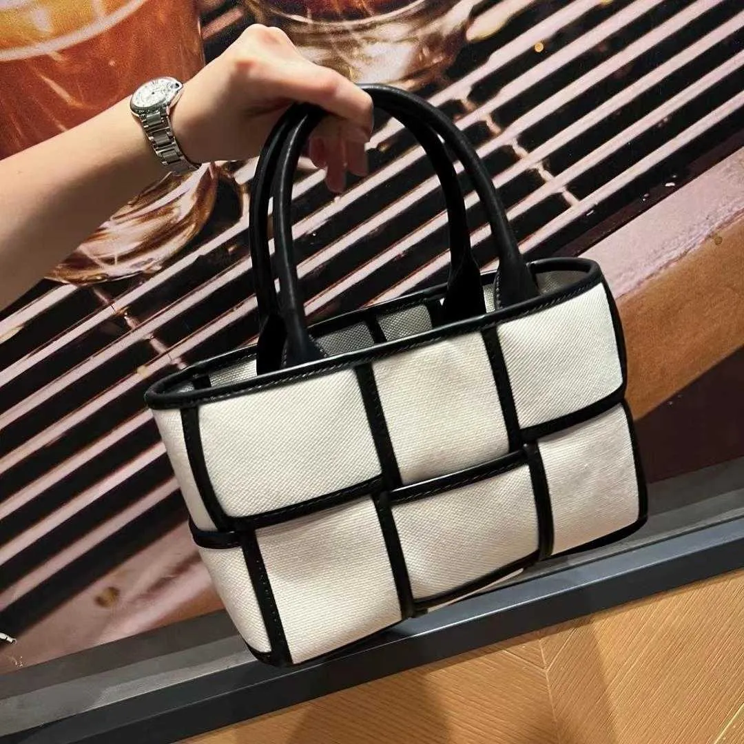 10A Qualidade Botegss Ventss Arco bolsas loja online feminina 2023 nova moda casual tecido à mão bolsa de lona ombro único cruz com logotipo real