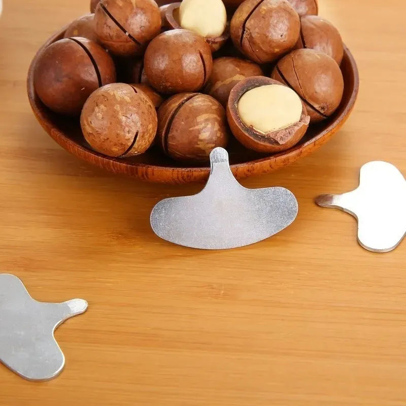 Przenośna nakrętka krakernia z orzechów orzechowe Macadamia Nuts metalowy klawisz otwieracz Nowe nakrętki narzędzie kuchenne LX0123