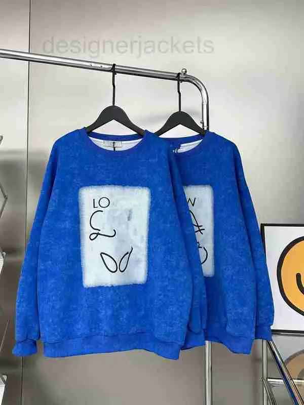 Sweats à capuche pour femmes Sweatshirts Designer Automne Nouveau Graffiti Lettre à jet d'encre Motif fait vieux lavage bleu pull mode couple coupe ample GMVJ