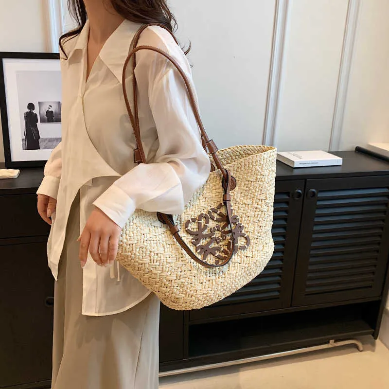 2024 New luxury high quality handbag Internet celebrity fashion trend Tote new summer texture niche large capacity straw woven foreign style shoulder bag for women