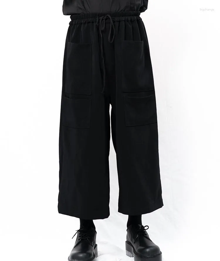 Calças masculinas casuais pretas simples perna larga cintura elástica multi bolso sino bottoms grande
