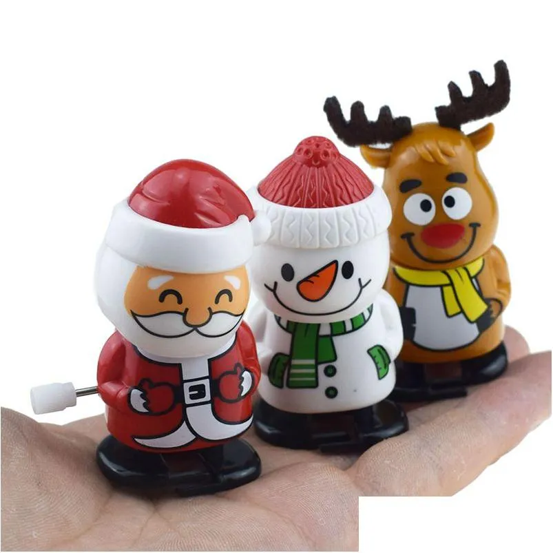 Decorazioni natalizie Bellissimi giocattoli a carica in plastica Babbo Natale Pupazzo di neve Orologio per bambini Salto Regalo Personaggi dei cartoni animati Regali Vt1759 Drop Dhnez