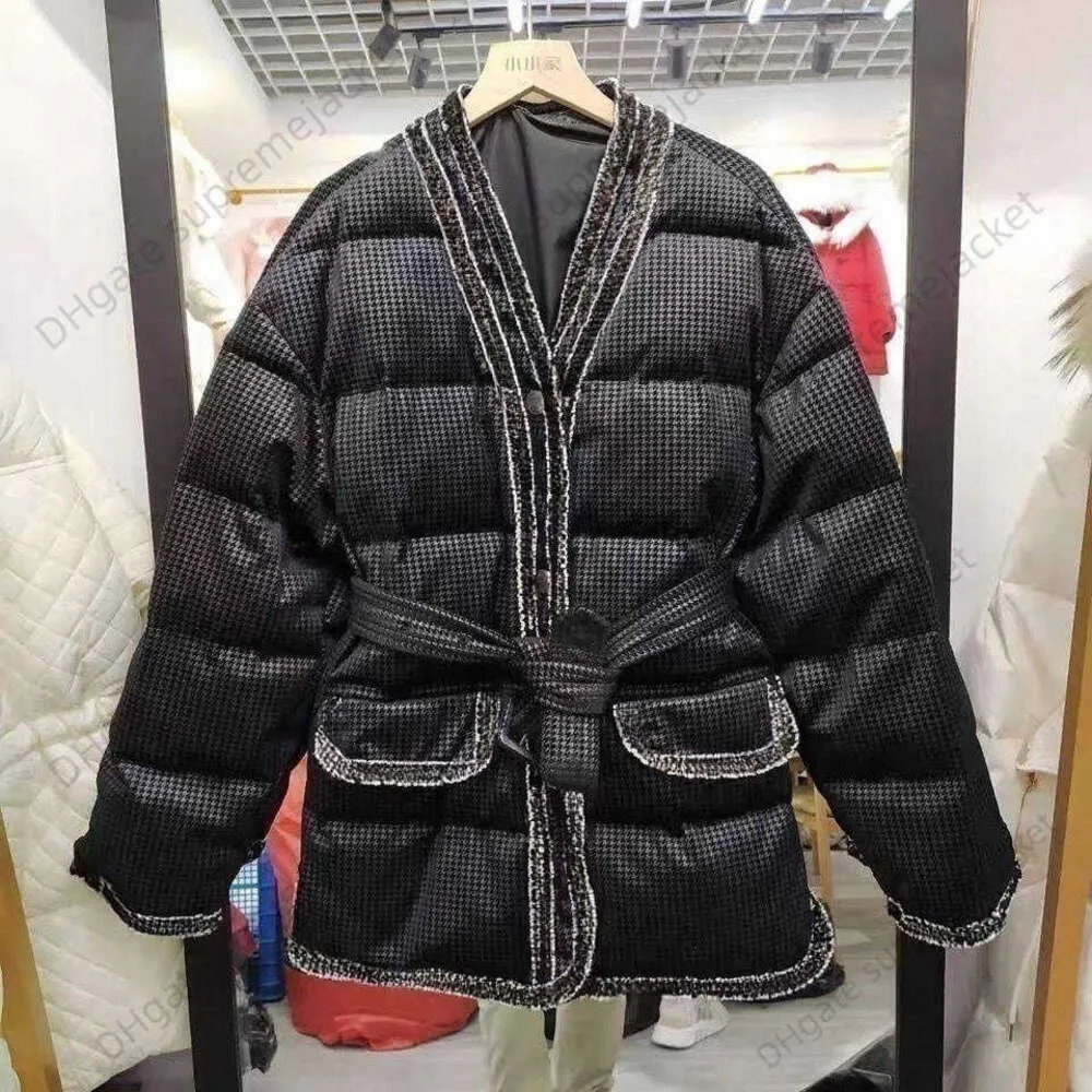 Nuovo piumino di lusso Cappotto da celebrità Cintura allentata alla moda Abbigliamento invernale Caldo piumino d'oca bianco