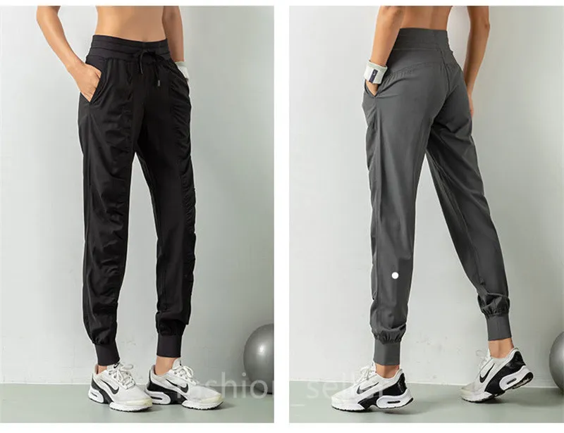 LL-YDK07 Calças de treino Calças femininas Calças de ioga Roupa solta Nona Calça Excerise Esporte Ginásio Correndo Casual Longo Tornozelo Banded Calça Elástica Cintura Alta Cordão