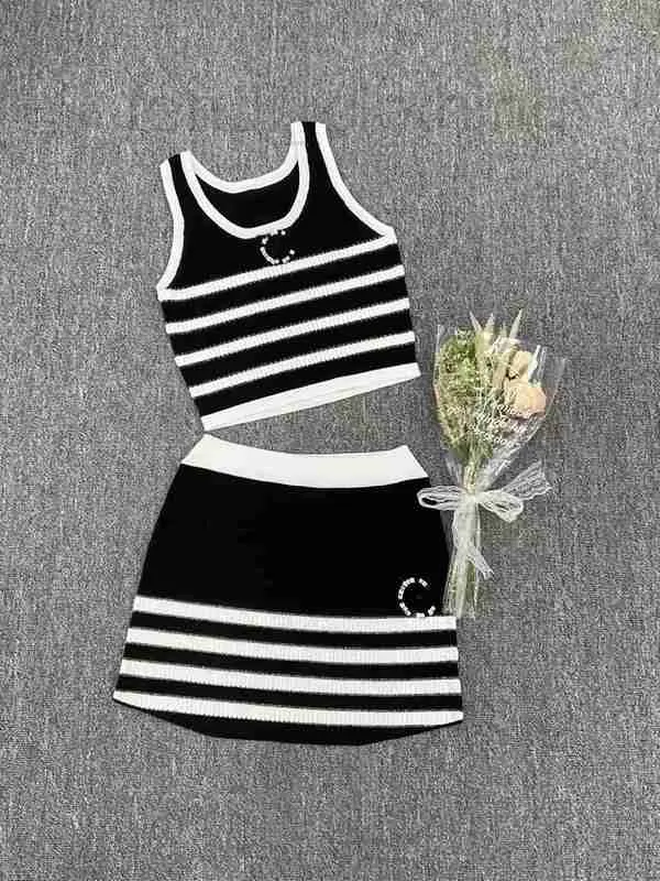 Two Piece Dress designer Summer New Style Black and White Stripe Color Matching Hot Diamond Knitted Tank Top+Hip Wrap Half Skirt Set 37HB