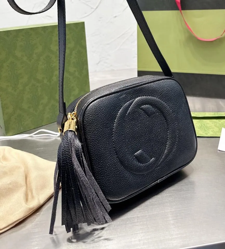 Black gucci bag with tassel hotsell