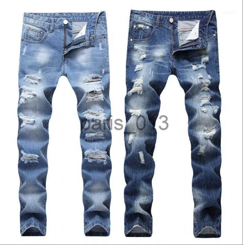 Męskie dżinsy 2018 Nowa moda Rise dżinsy mężczyzn Patchwork pusta wydrukowane żebrakowe spodnie Man Cowboys Demin Pants Mężczyzna Dropshipping11 x0909