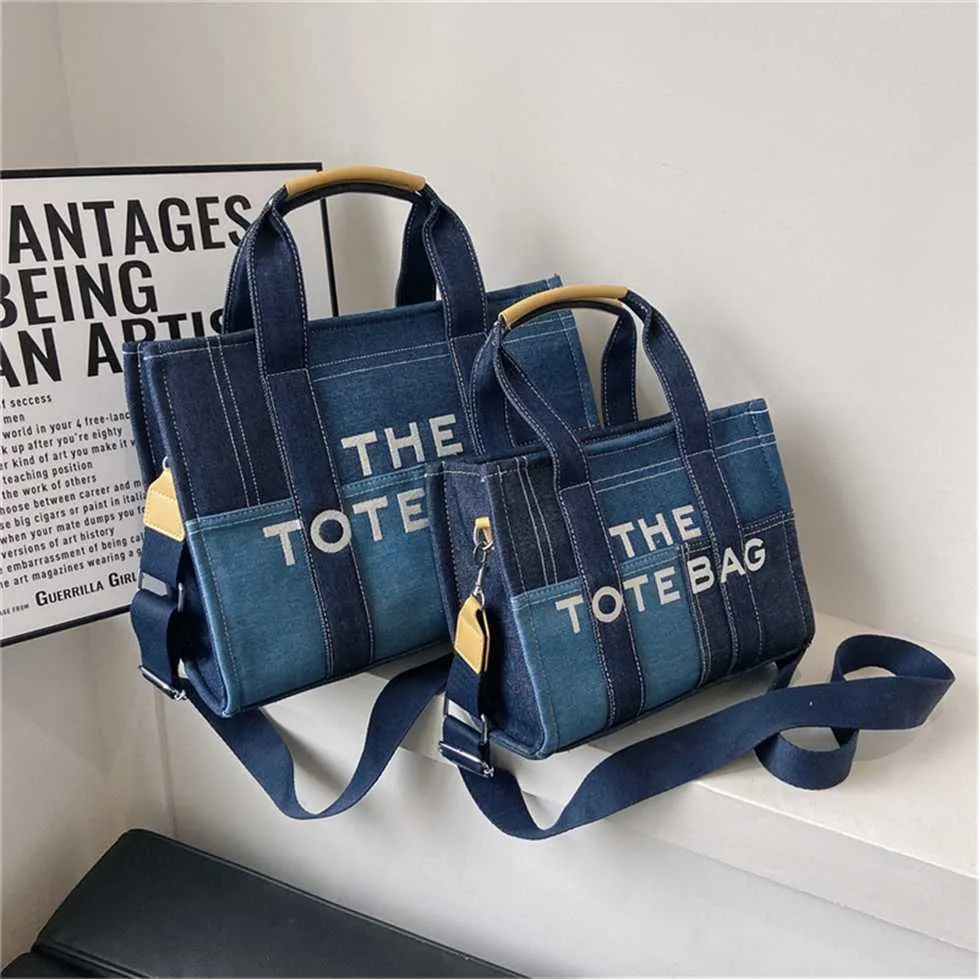 Popular bags for sale New denim color contrast splicing portable tote high-grade sense minority embroidered letter messenger