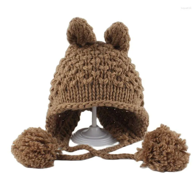 冬のポンポム頭蓋骨ビーニーキッズ漫画の耳のかわいい赤ちゃんの帽子かぎ針編み編み少年少年衣装ビーニーハットヒップホップキャップ