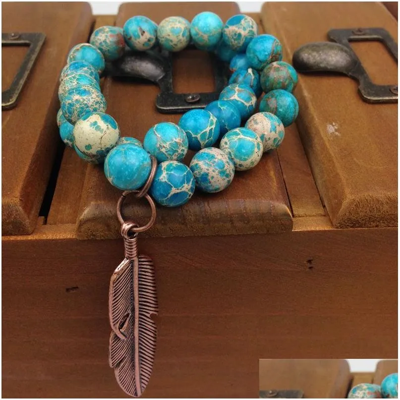 Beaded St0188 10Mm Stretch Real Blue Regalite Bracelet Set With Copper Feather Charms Imperial Jasper Beads Drop Delivery Jew Dhgarden Dhmoa