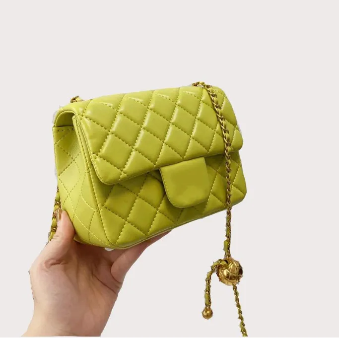 Neon yellow store designer bag