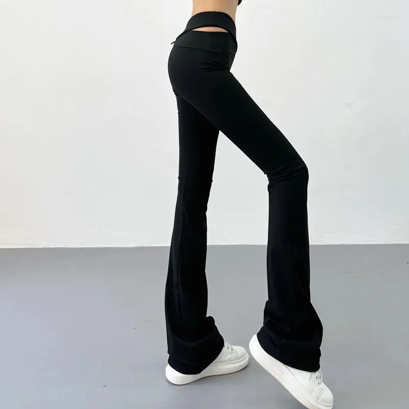 Pantaloni da donna americani TVVOVVIN autunno europeo nero a vita alta avvolgente anca a forma di V croce cava elastico Yoga SL9I