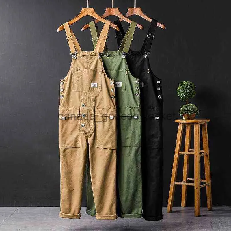 Mäns jeans Lossa New Men's Cargo Bib Overgav byxor Multi-Pocket övergripande män Casual Coveralls Suspenders Jumpsuits Rompers bär coveralll230911