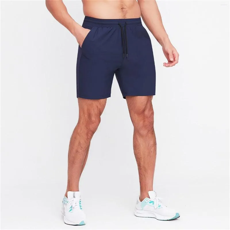 Shorts pour hommes entraînement avec poches solide Fitness Jogging sport cordon confortable entraînement pantalons de vêtements de sport